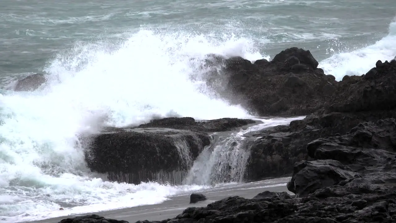 Oregon rocks with crashing waves