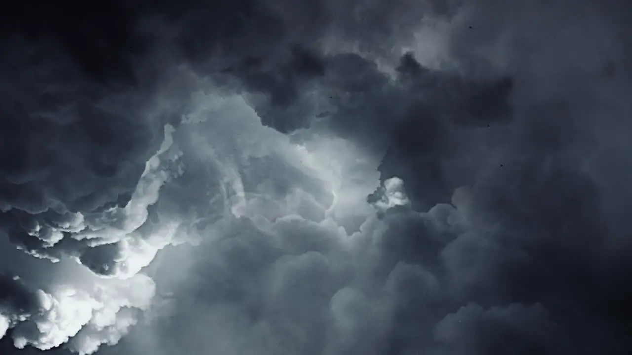 4k thunderstorm dark clouds moving over dark sky