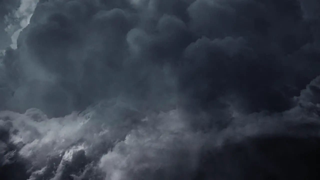 4K Flying above large storm clouds