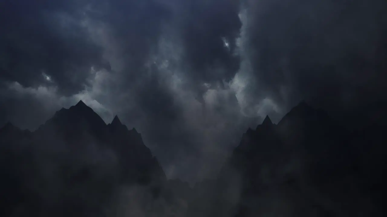 time-lapse of silhouetted mountains on the background of dark clouds and lightning strike