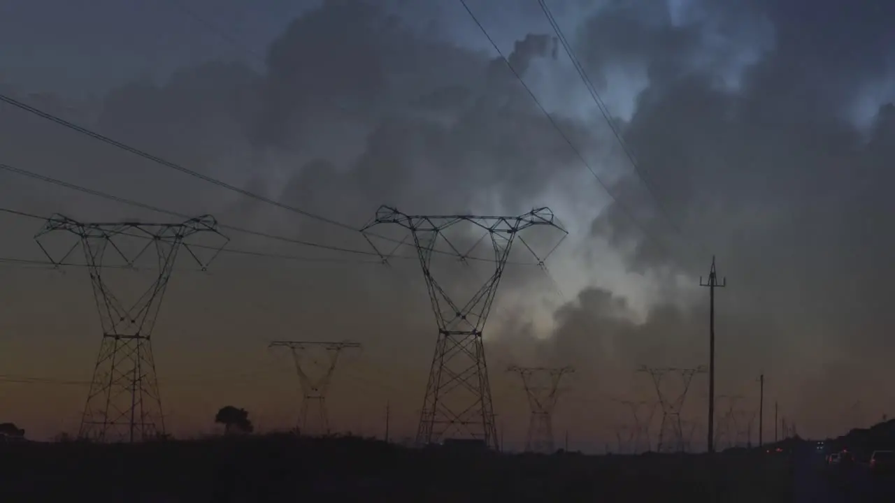 Transmission towers and lightning in clouds