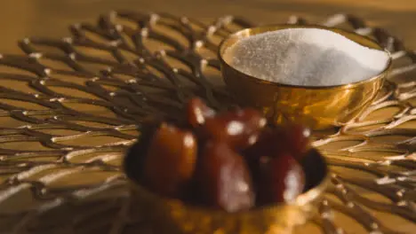 Close Up Of Bowl Of Dates On Table In Muslim Home Celebrating Eid 1