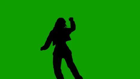 Studio Silhouette Of Woman Dancing Against Green Background 1