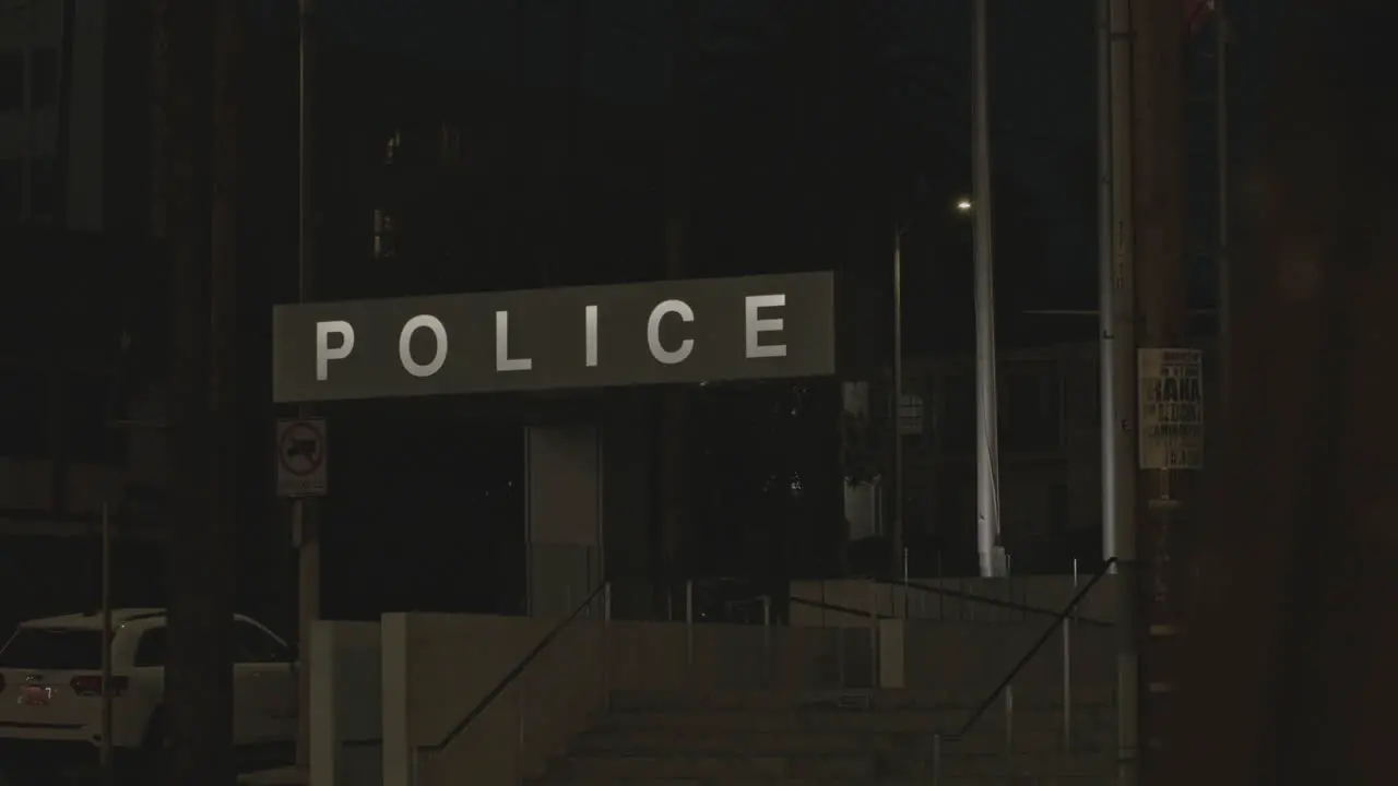 Static Close-up Of A LED Police Sign Outside A Police Station And Headquarters