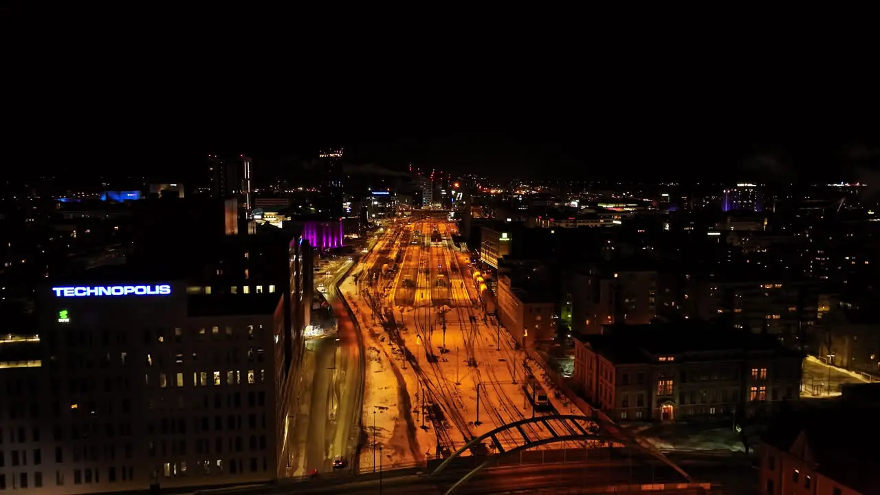 Aerial view toward the train station winter night in downtown Tampere Finland