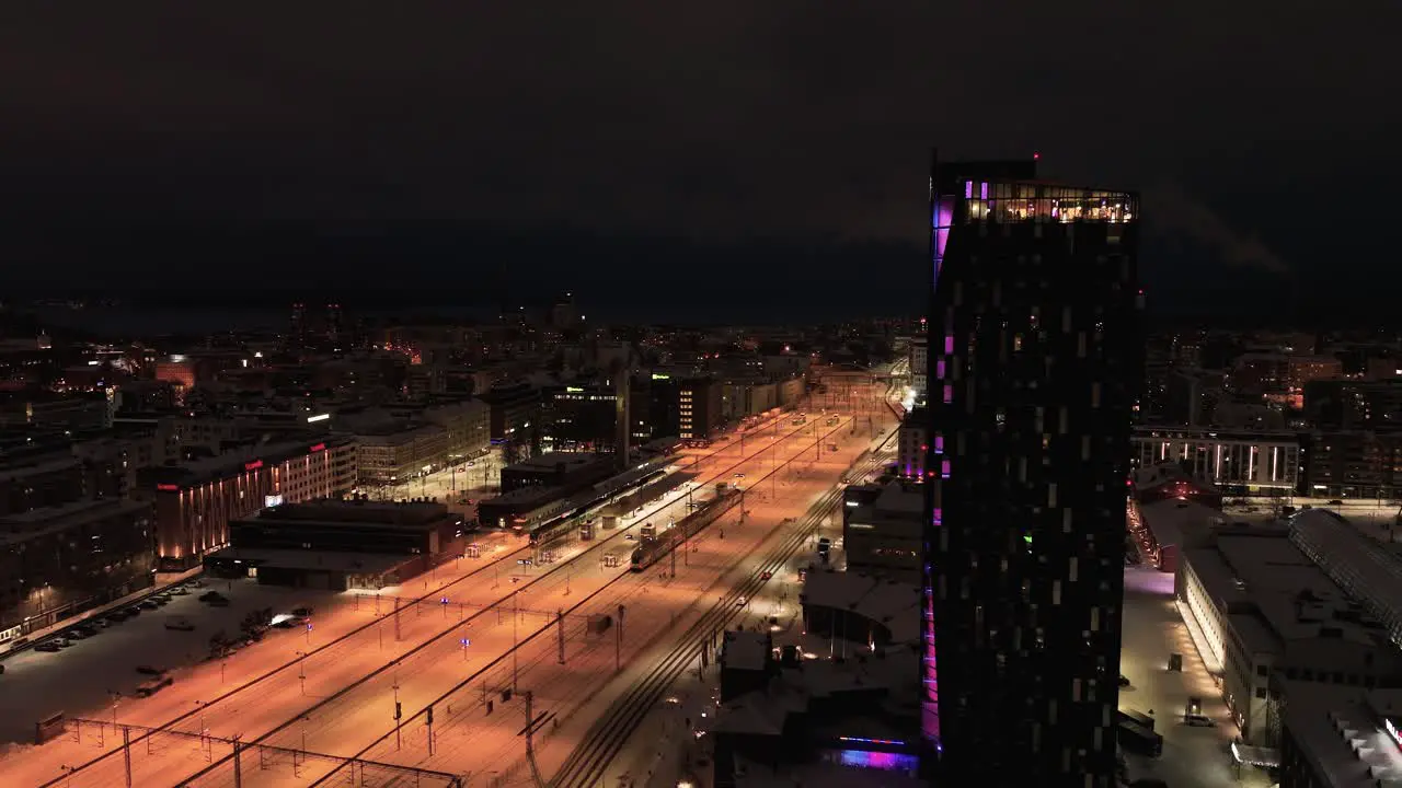 Aerial view of Illuminated hotel Torni and the train station in Tampere Finland