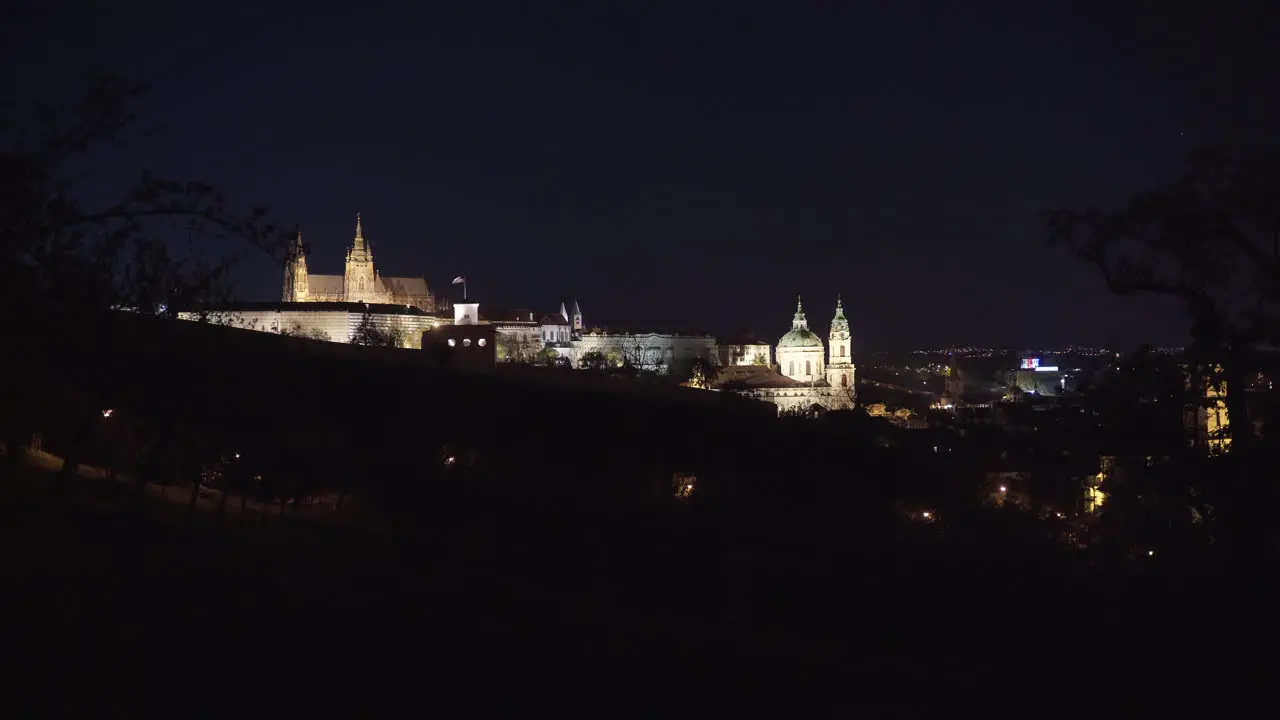 Prague castle Czechia at night lit by street lights view from Petřín park