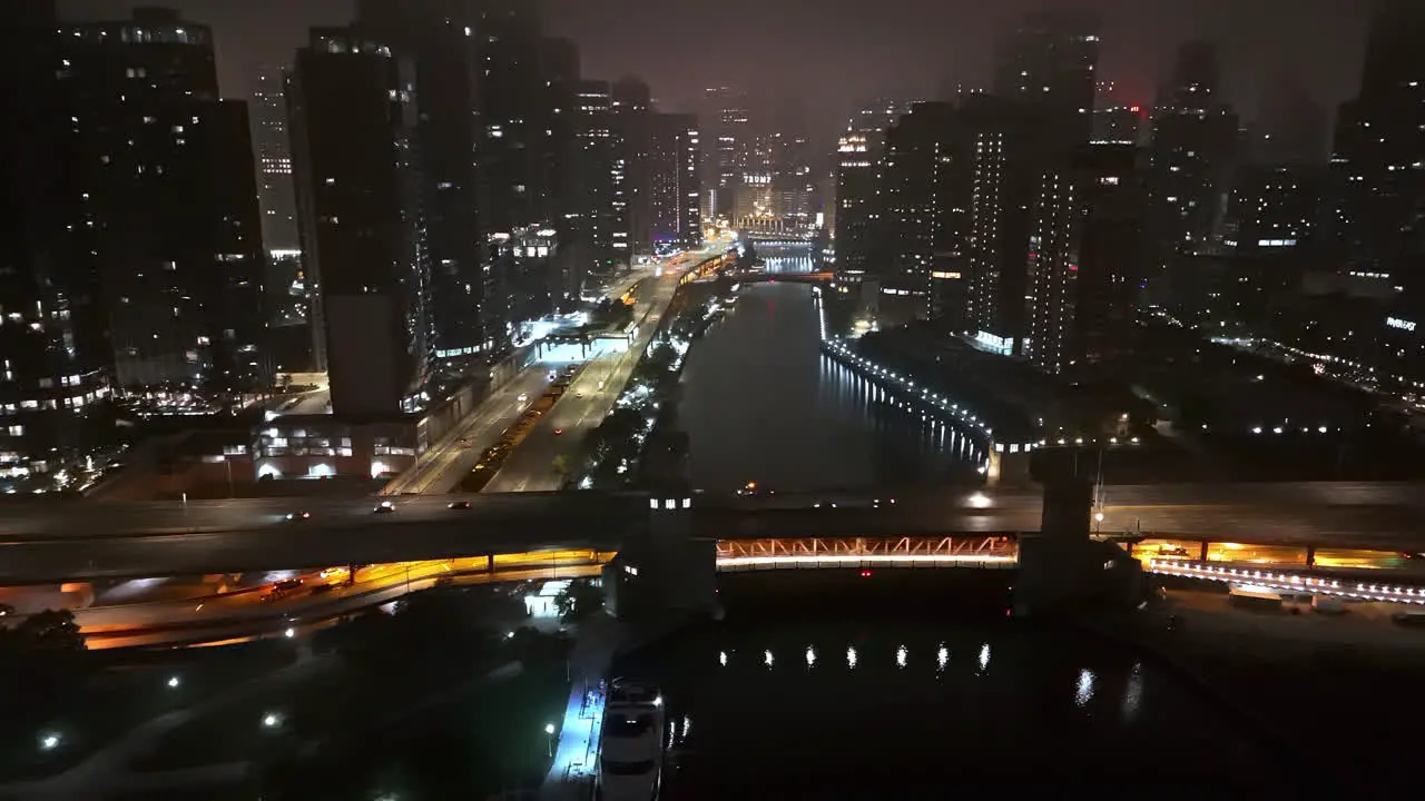 Aerial view of traffic on the Franklin Delano Roosevelt Bridge misty night in Chicago USA