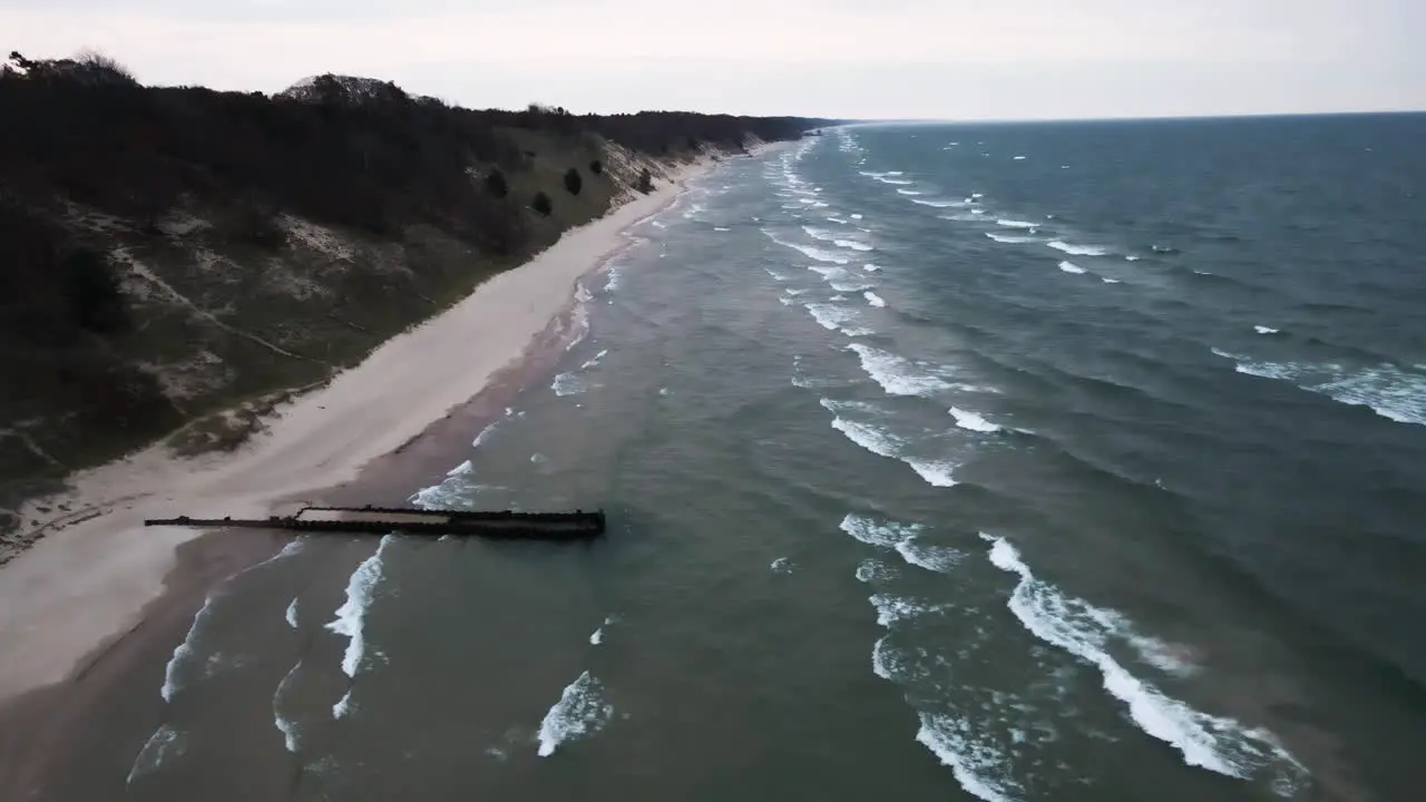 Winter Waves on Lake Michigan with reverse tracking motion while looking south toward Grand Haven