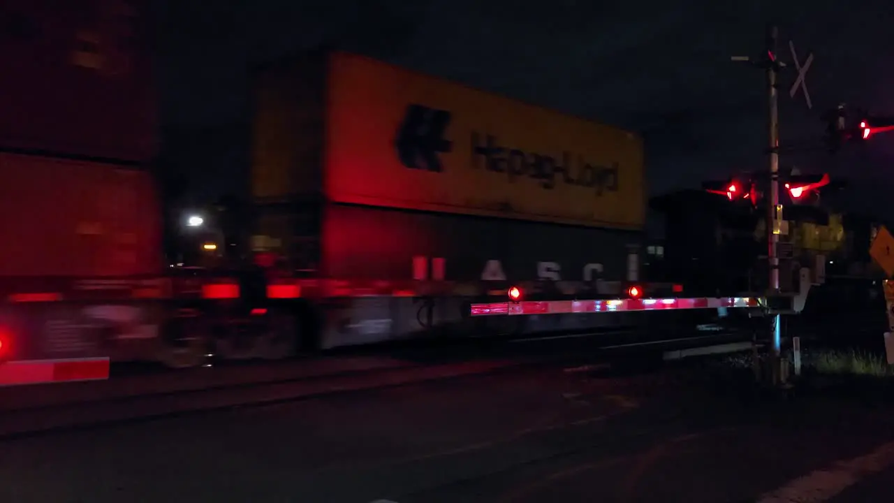 Two trains in opposite directions converging passing commuter train station Montreal Quebec