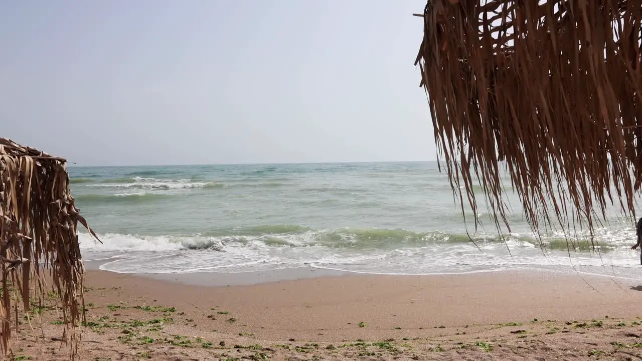 Sea Waves Rolling On The Sandy Shore Of A Beach In Vama Veche Romania wide