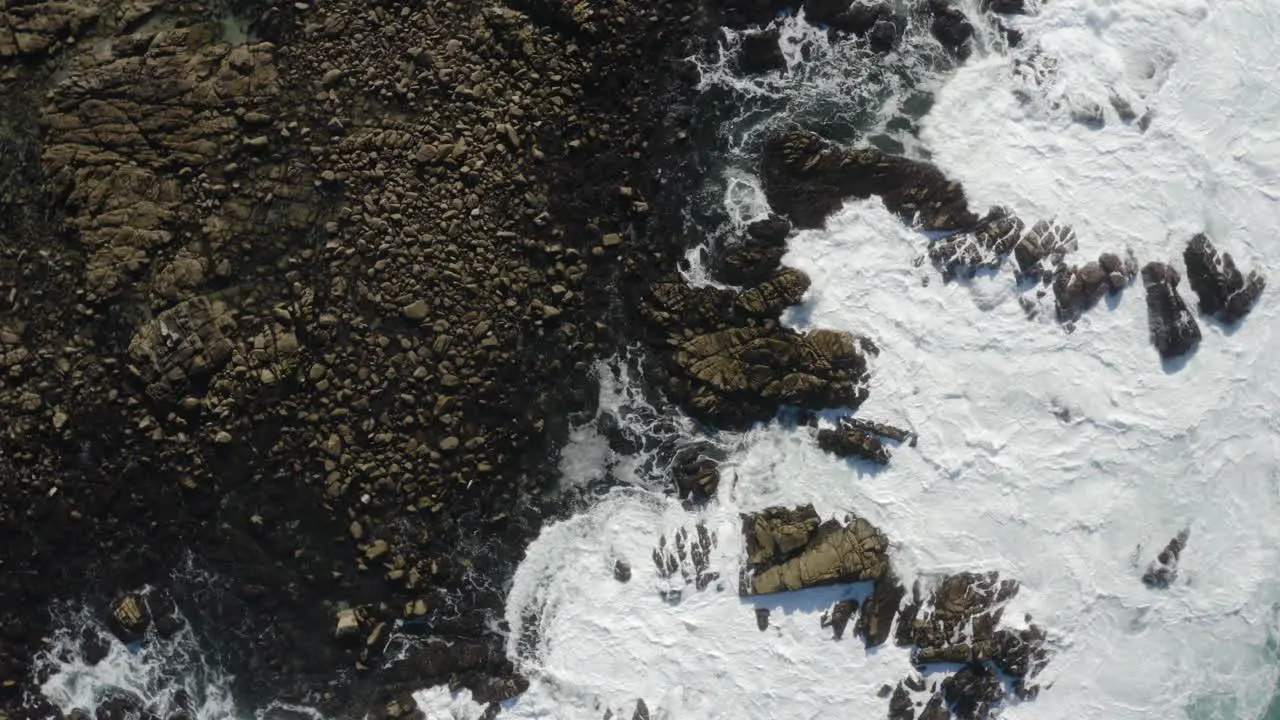 Dizzying 4K cinematic overhead of rough seas on the California Coastline