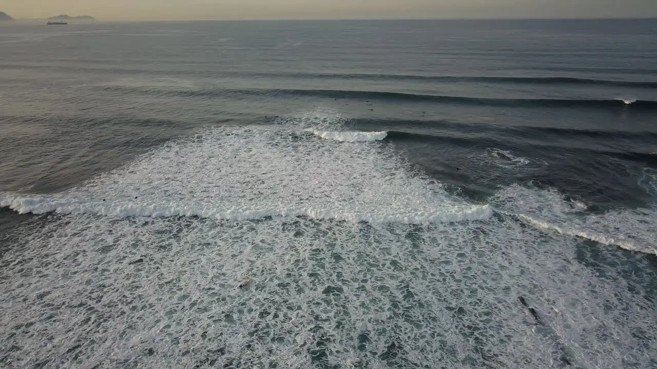 Aerial View of Ocean Splashing Waves Dark Blue Wavy Sea Waters with White Foam drone shot