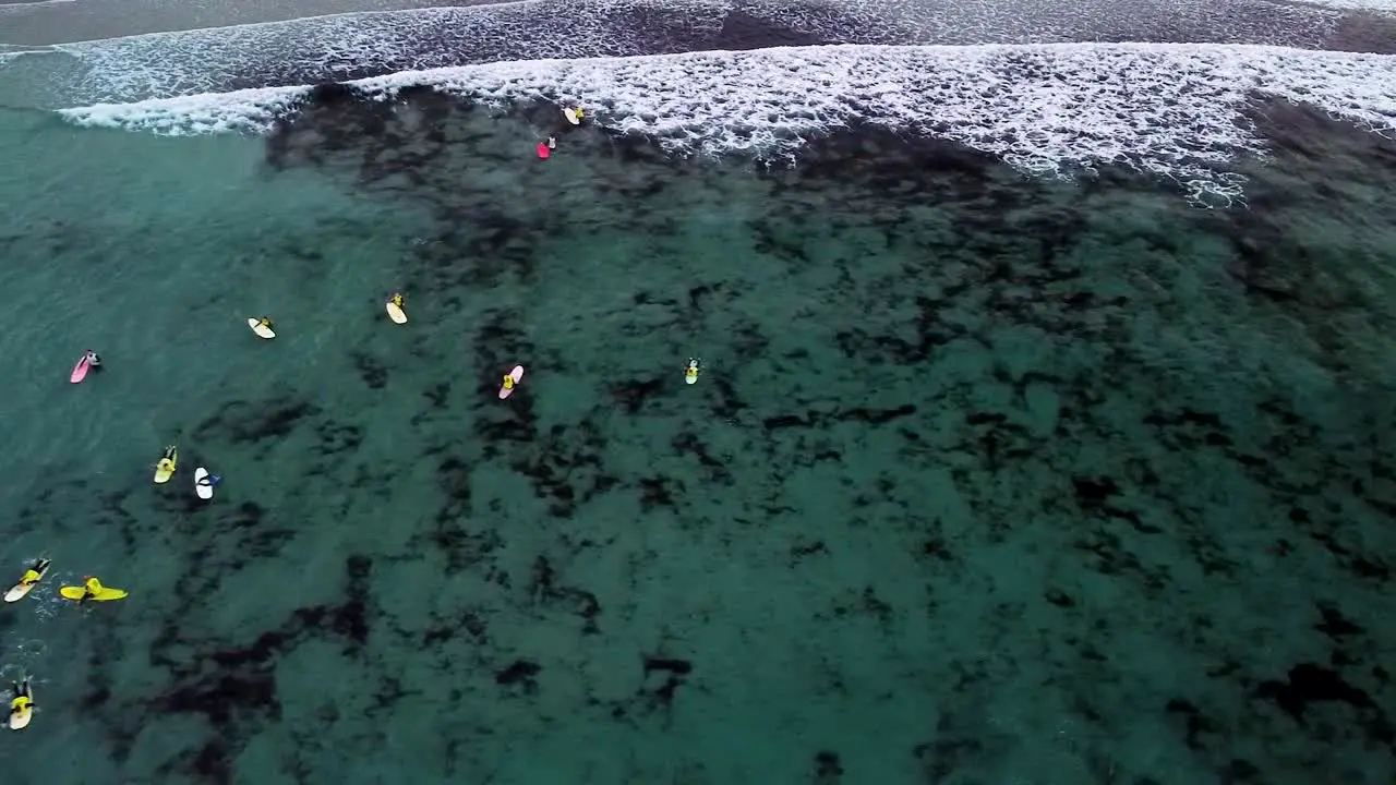 Surfers On The Surfing Sea Waves In Caion Galicia Spain