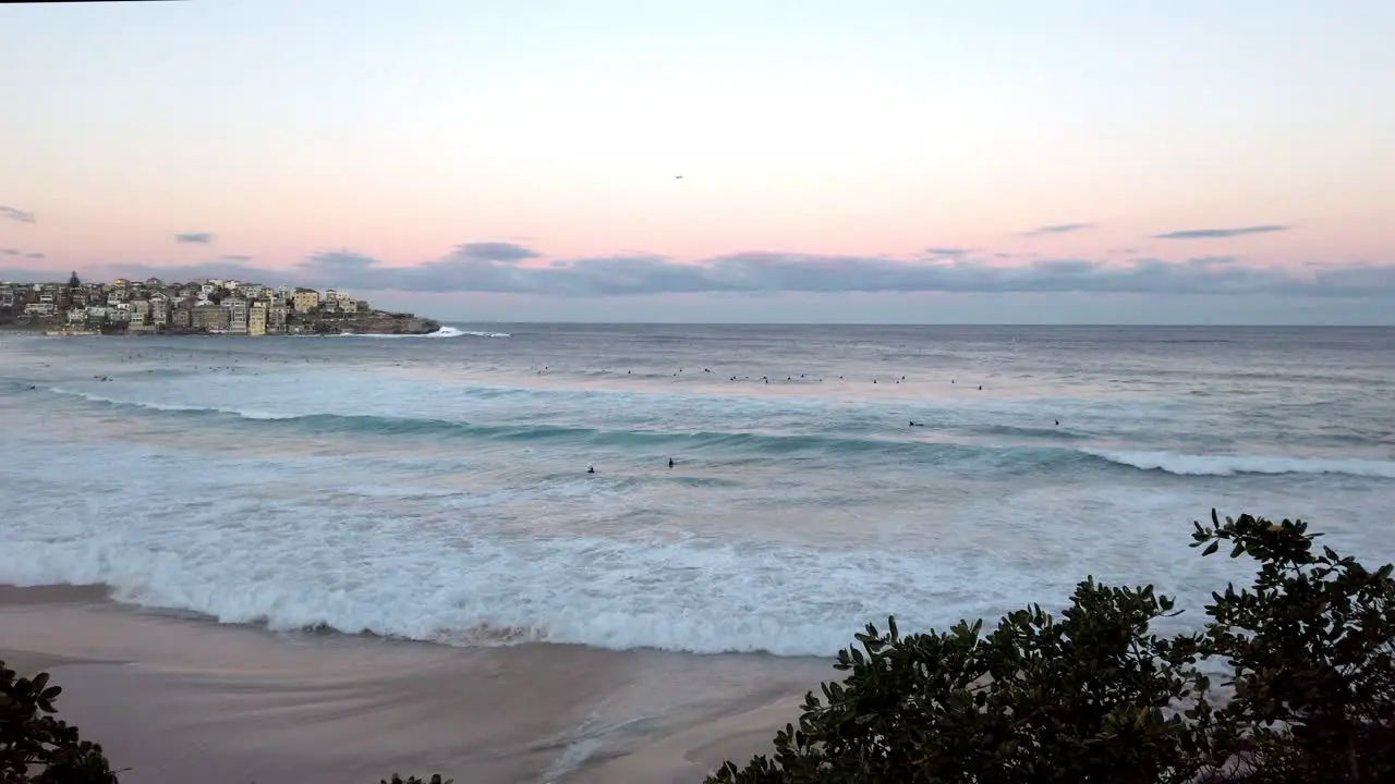 Tidal Waves Catching By Surfers At Bondi Beach During Sunset In Sydney NSW Australia