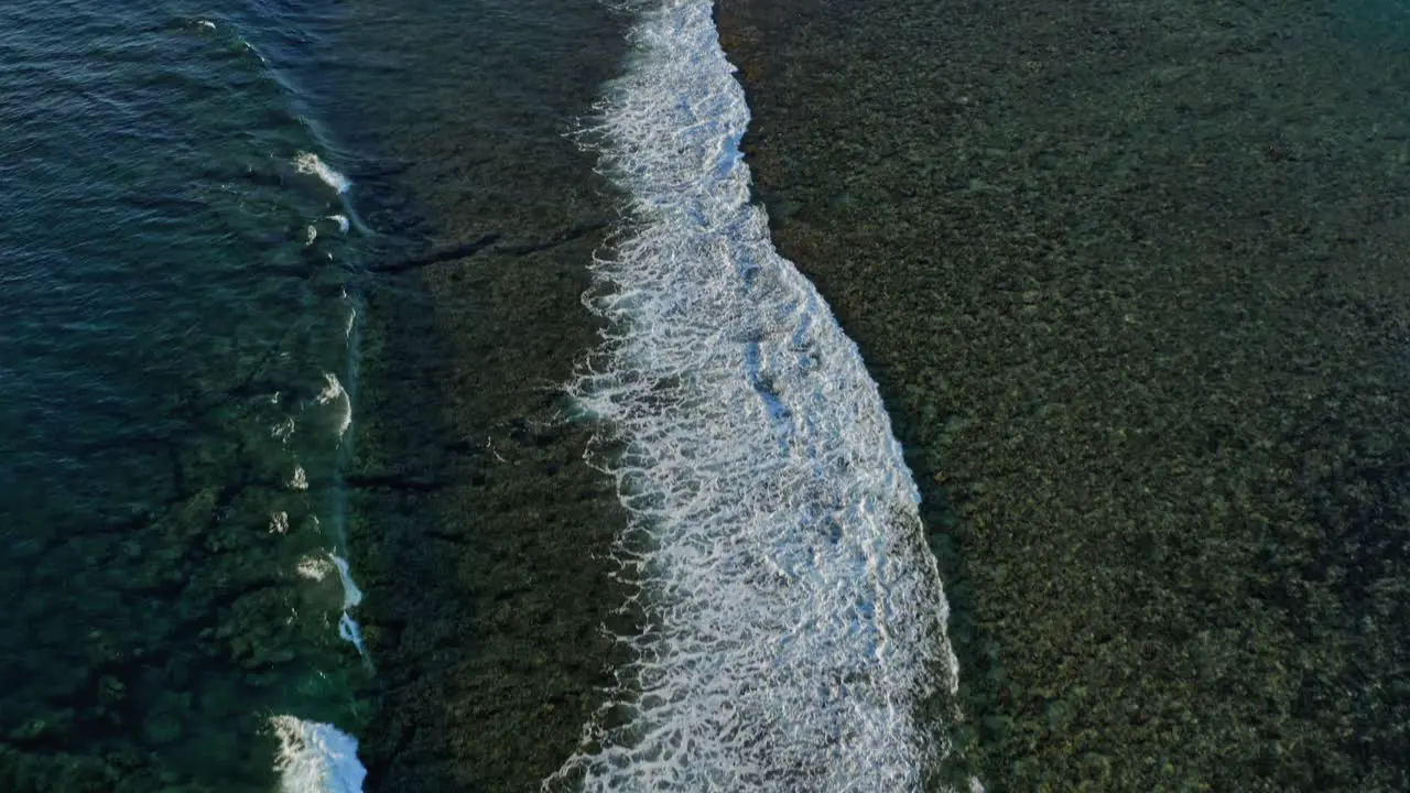 Ocean Waves of Mauritius Indian Ocean Aerial Drone Top Notch Above Water Coast Shore and Skyline