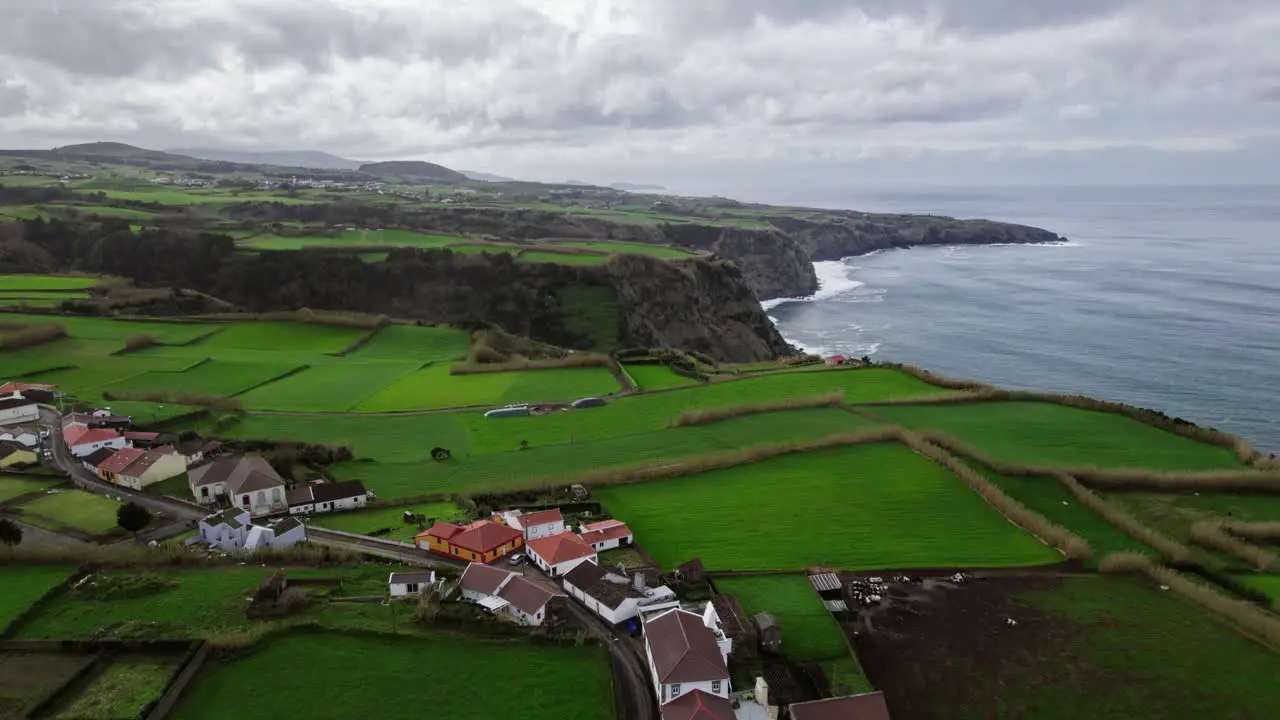 Aerial view of an Azores Island Sao Miguel view of the mountains at the atlantic ocean with green fields