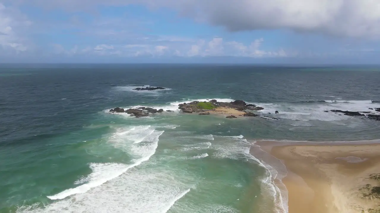 Clouded Sky Over Seascape With Crashing Waves At Rocky Headland In Sawtell Beach Near Bonville Headland NSW Australia