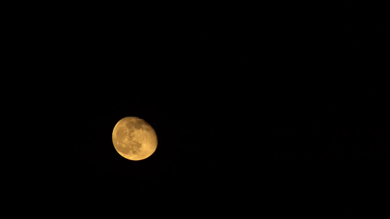 Moon Travelling to Bottom Left Of Frame To Middle Of Frame