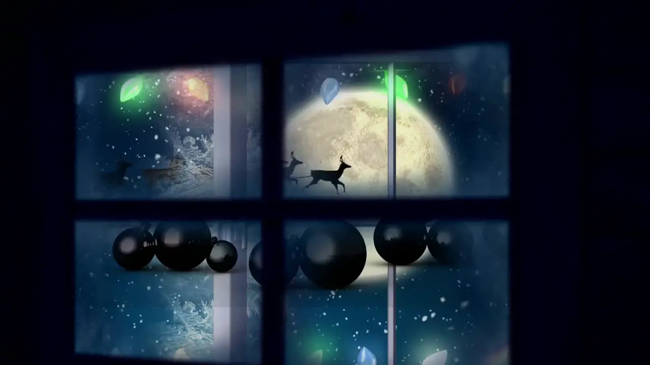 Window frame over christmas baubles hanging and snow falling against moon in the night sky