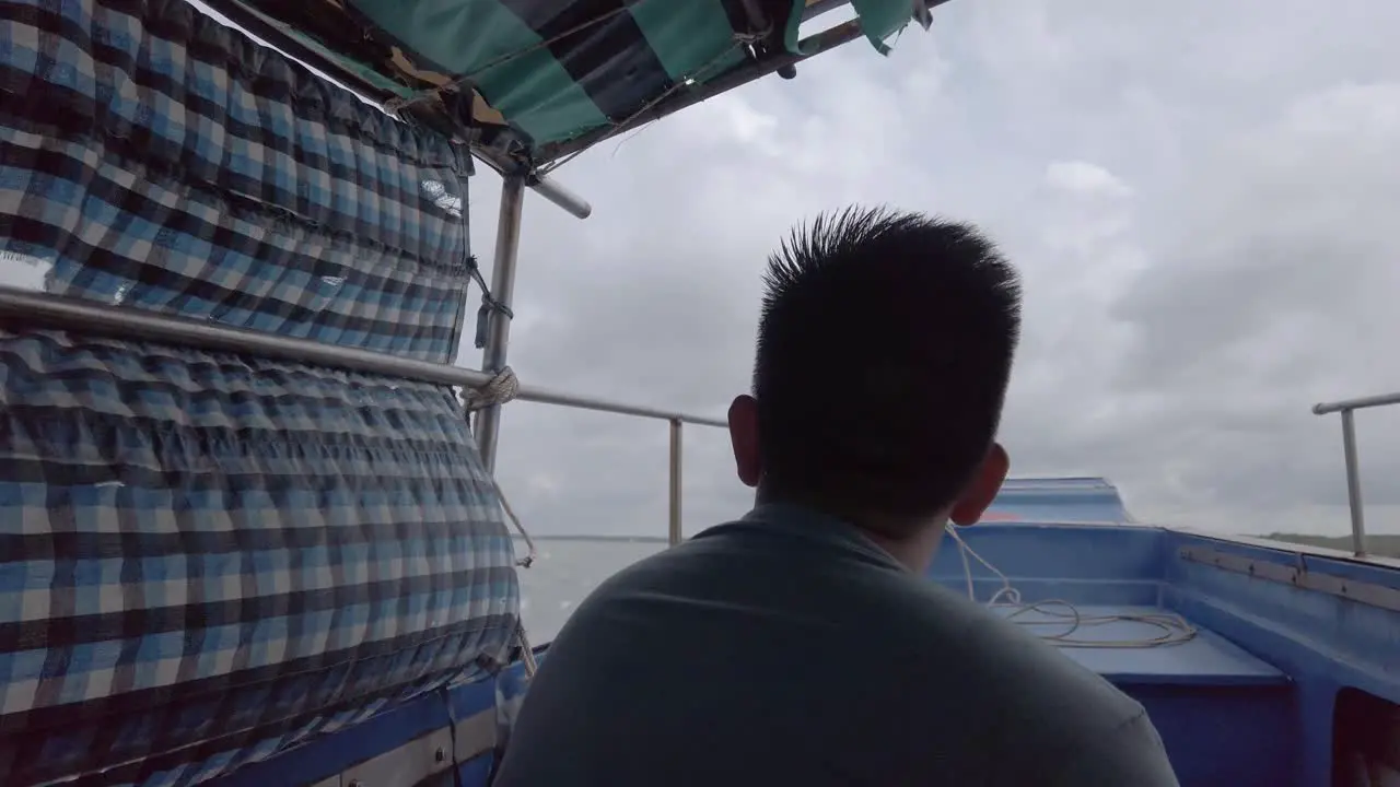 Crossing water by traditional Vietnamese motor boat in