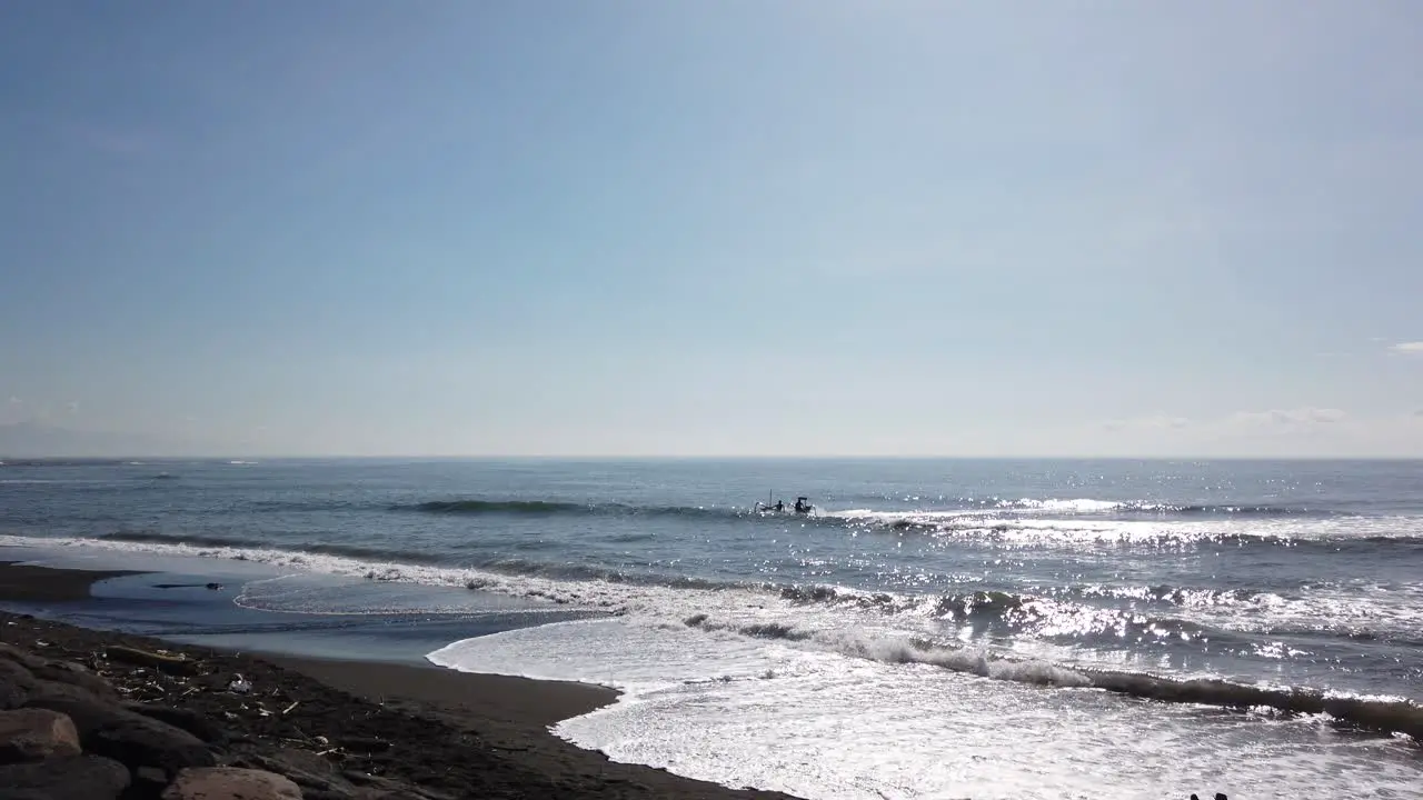 Small Fisherman Boat Arriving To The Beach Shore East Bali Indonesia Big Waves 60 FPS Strong Waves