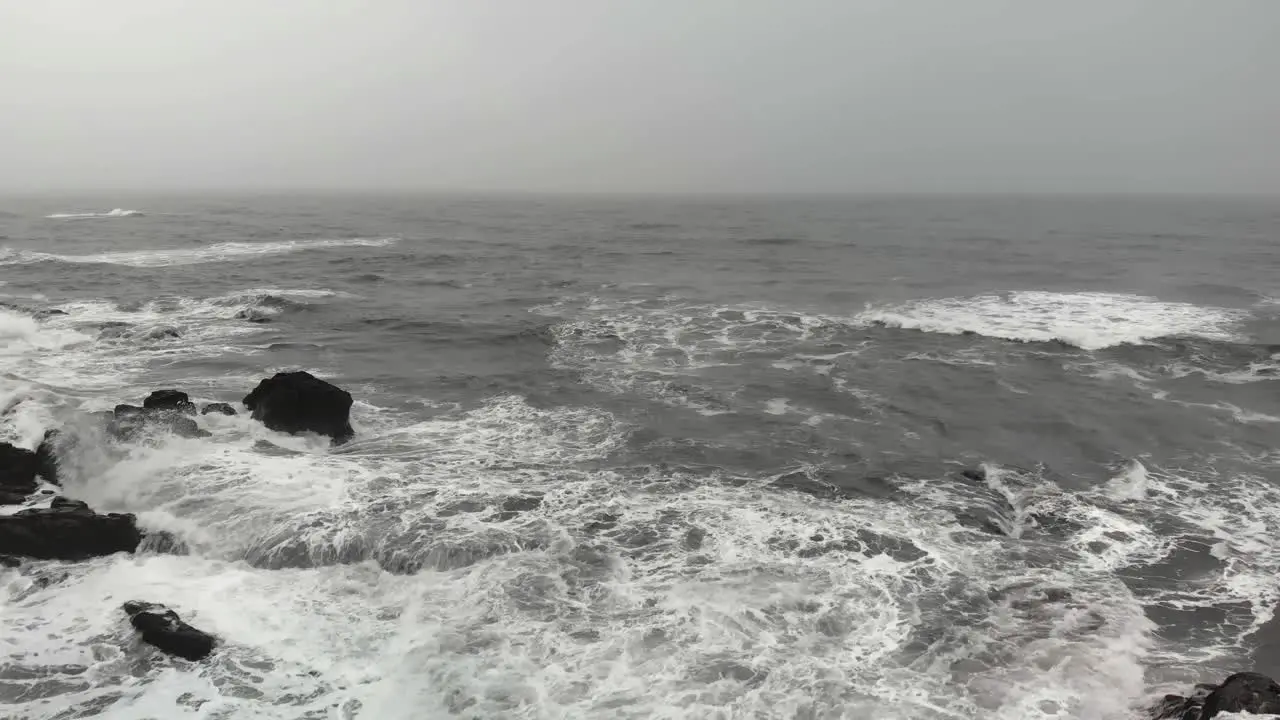 Aerial footage over a black beach in Djupavogshreppur Iceland-2