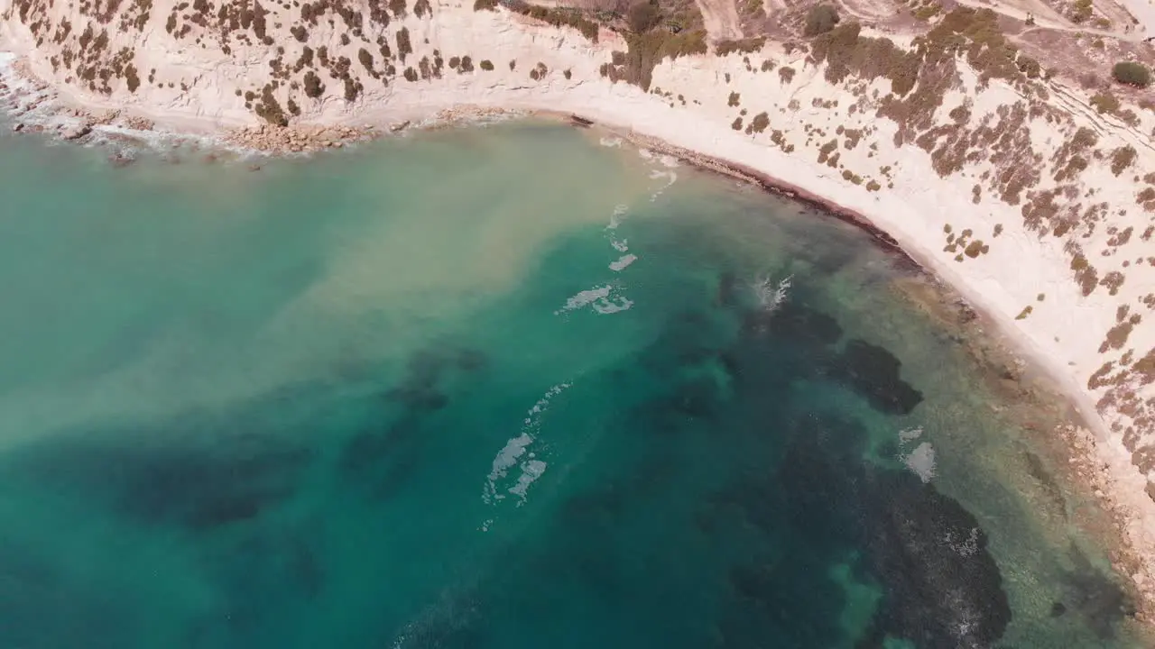 Aerial drone video from eastern Malta Marsaxlokk area Il-Hofra l-Kbira bay