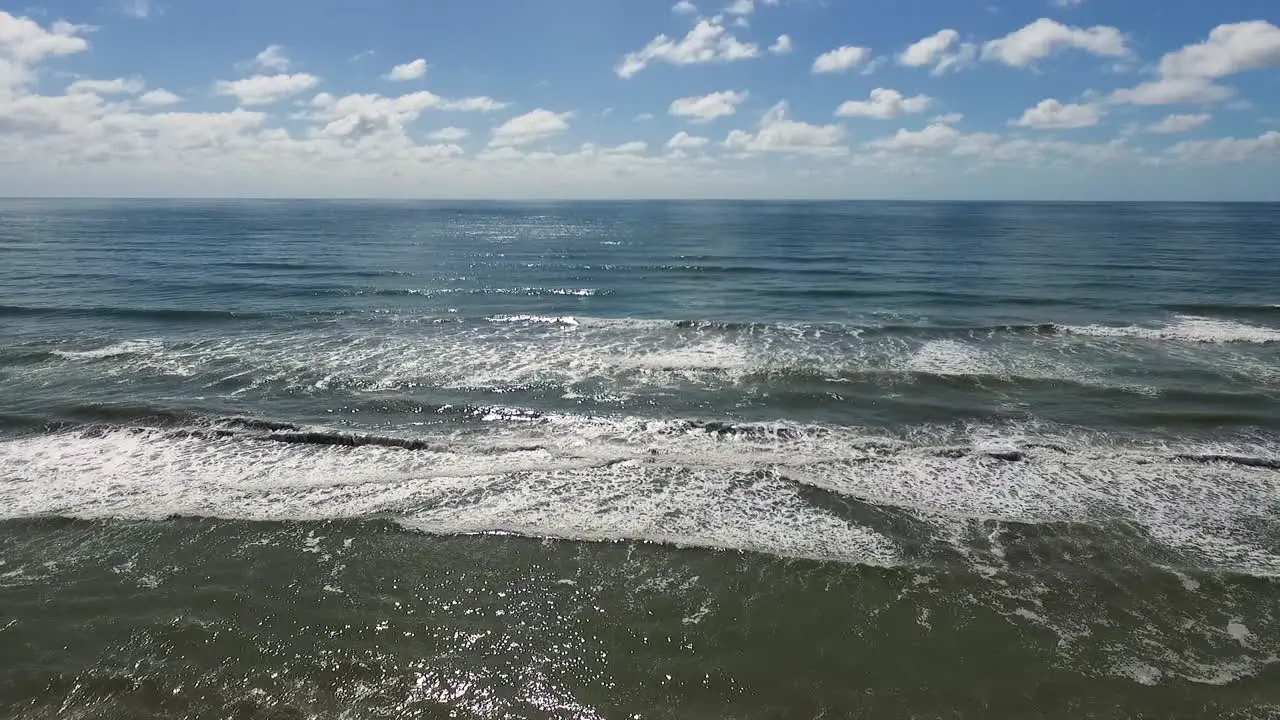 Sunny Summer Day Above Atlantic Ocean Horizon and Sandy Beach Aerial View