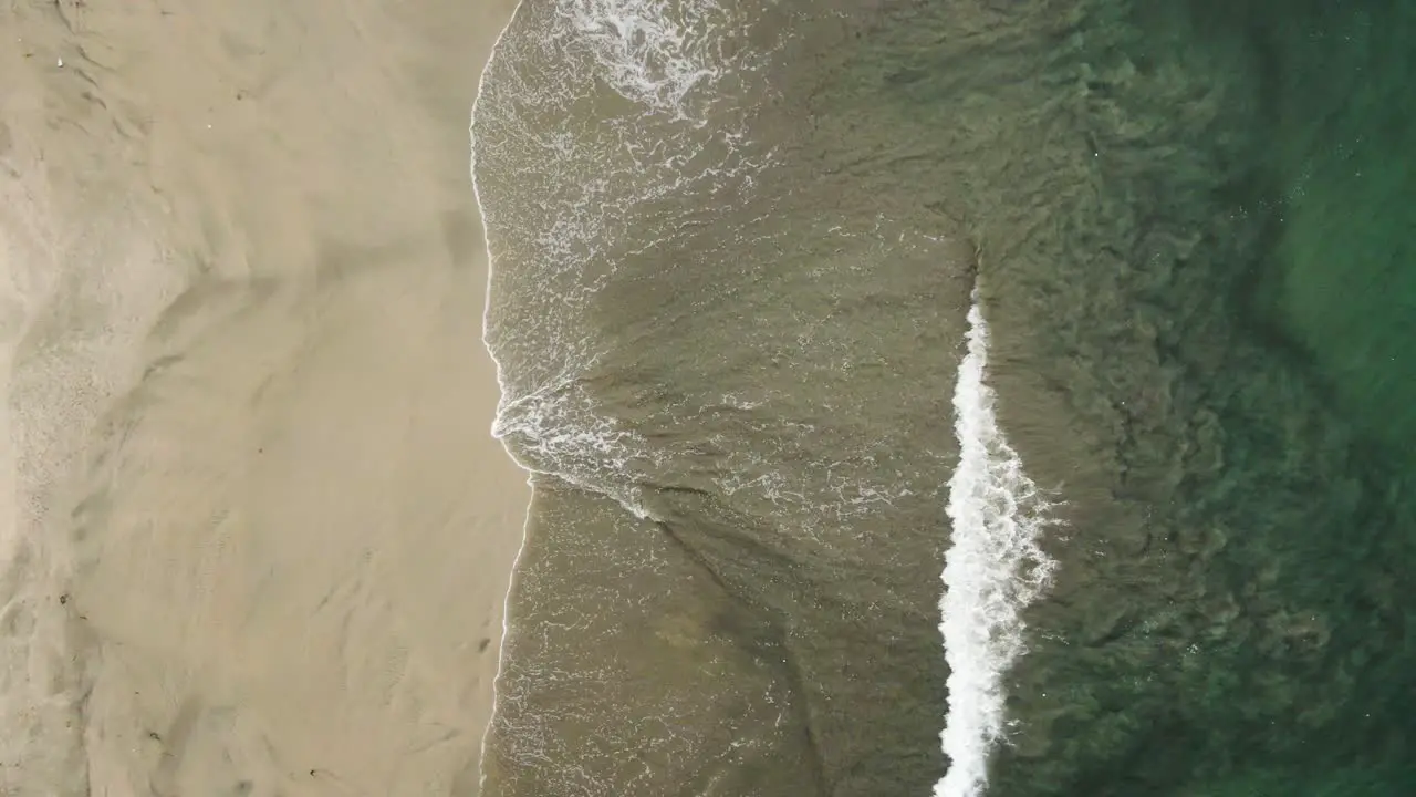 4K Drone Crashing Waves On White Sandy Beach Shore