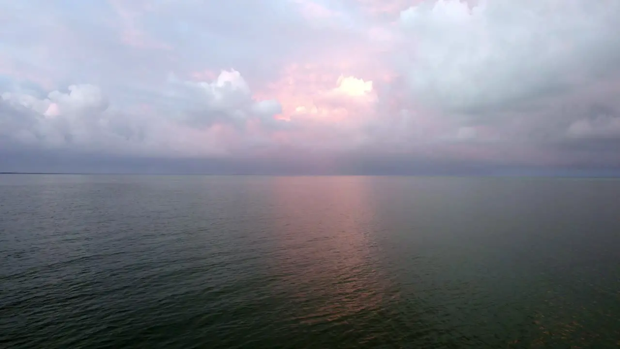 The dramatic twilight sky over the beach