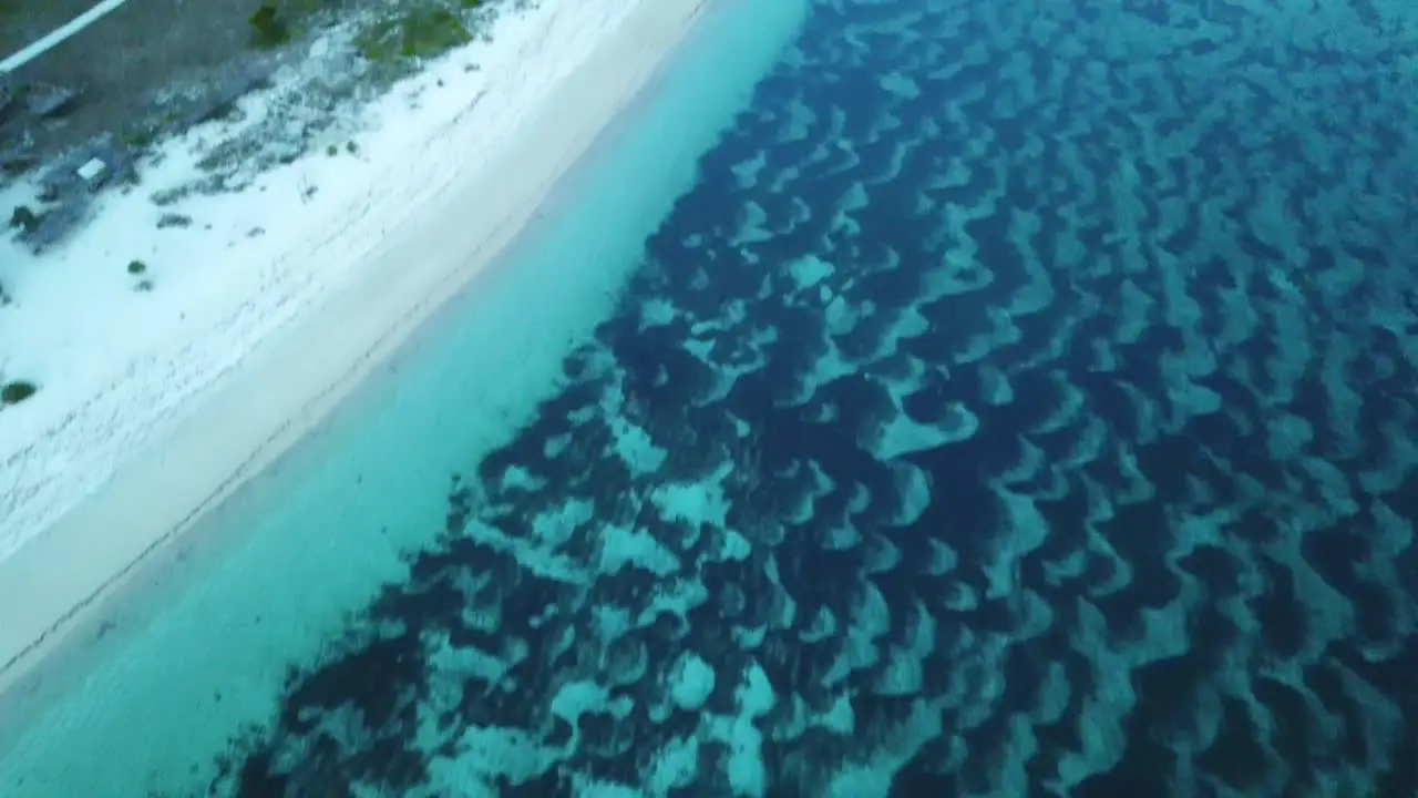 AERIAL 4K Panning Amazing Blue Waters at Isolated Beach in Indonesia