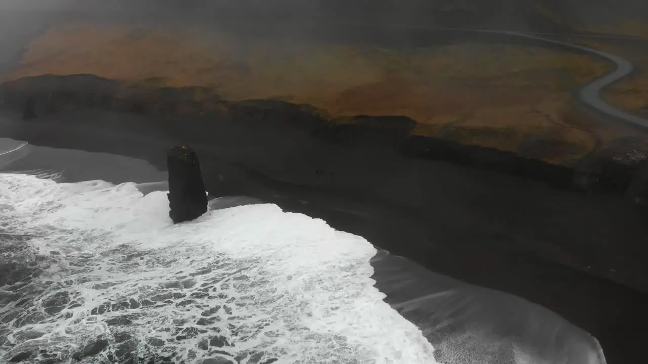 Aerial footage over a black beach in Djupavogshreppur Iceland-4