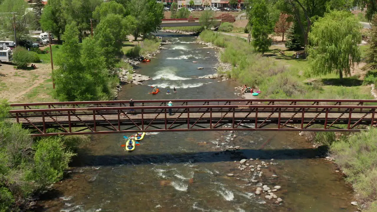 People floating down the San Juan River in inflatable rafts Pagosa Springs Colorado