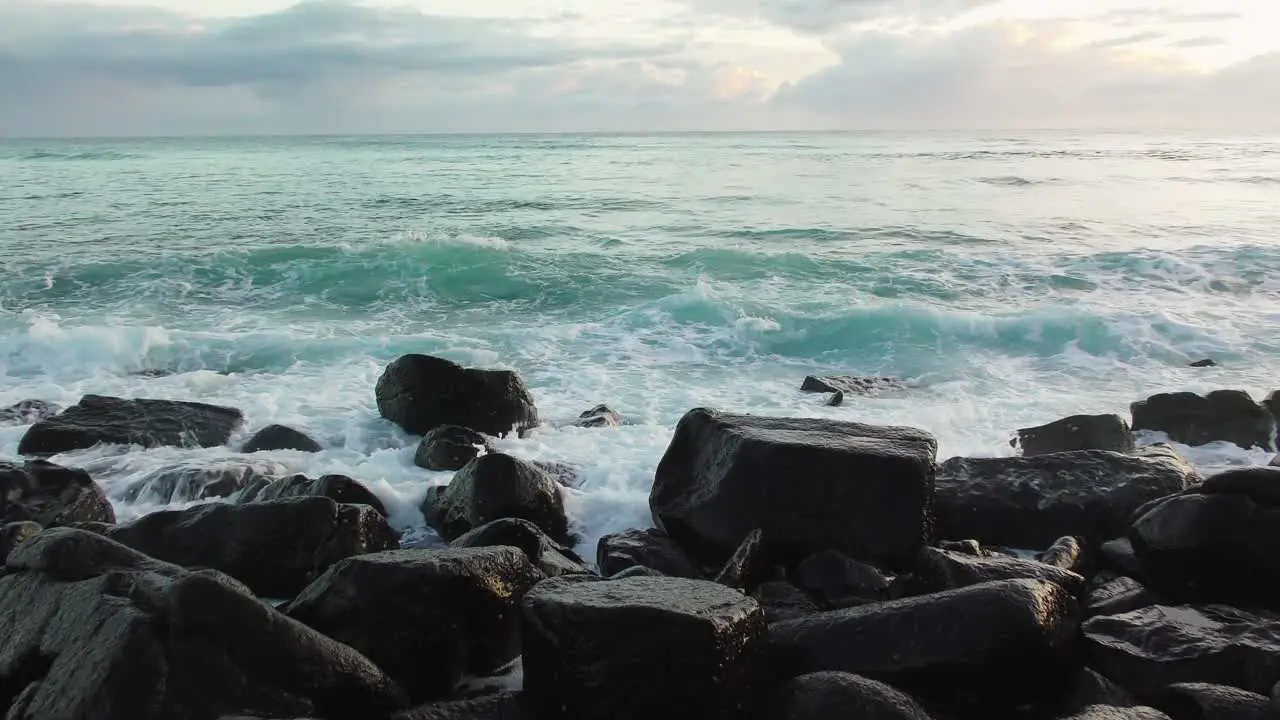 Waves Rolling In Hitting Rocks Splashing Water Coastside