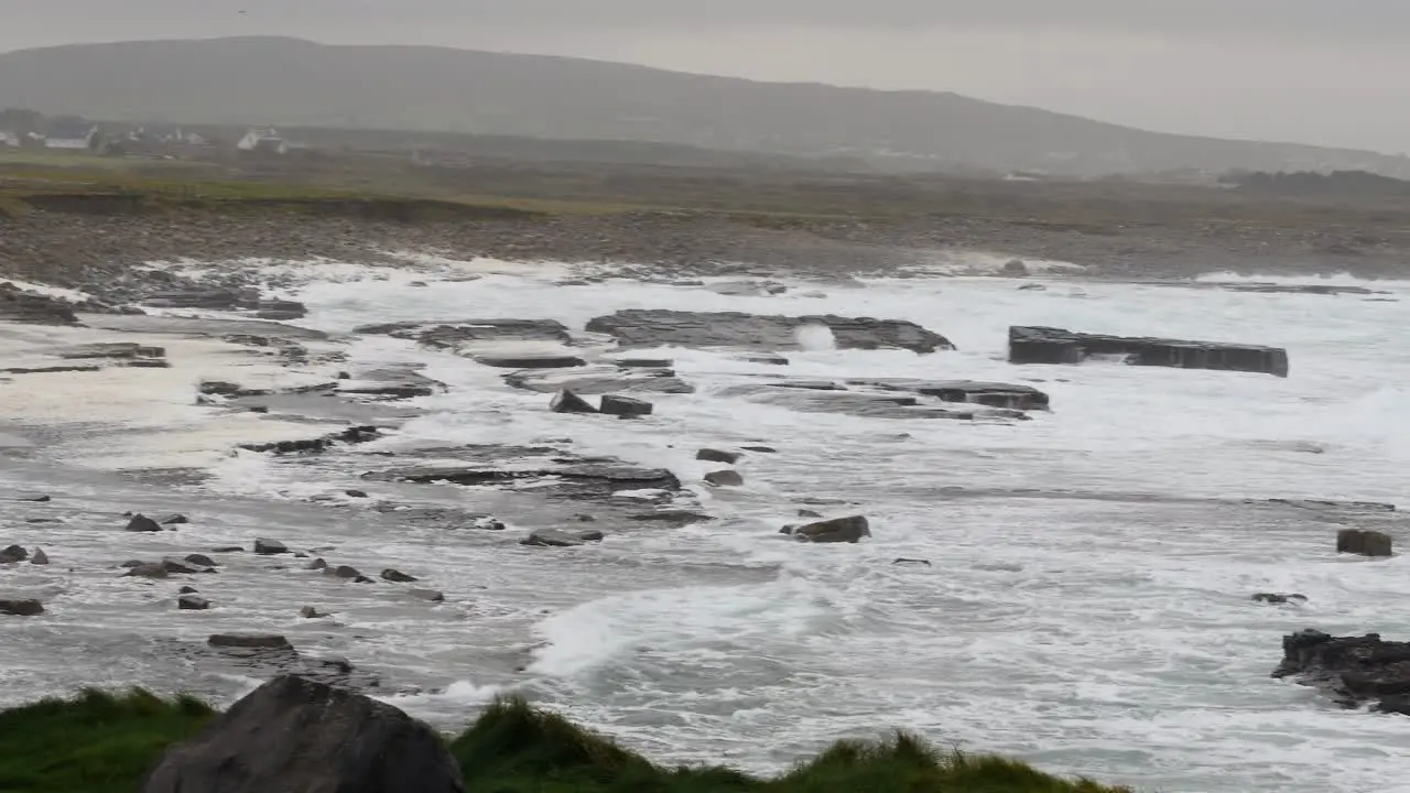 North Atlantic crashing waves rainy day panorama in County Mayo