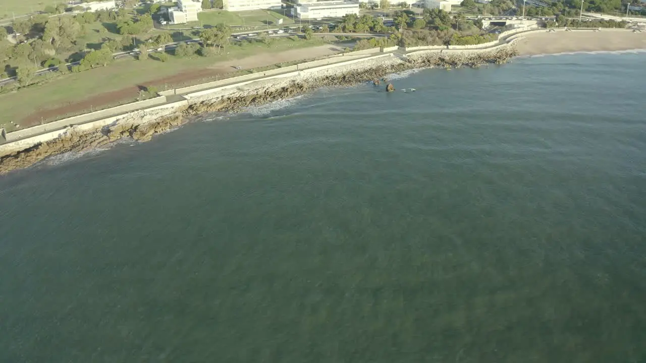 Aerial view of beach of Paço de Arcos in a sunrise