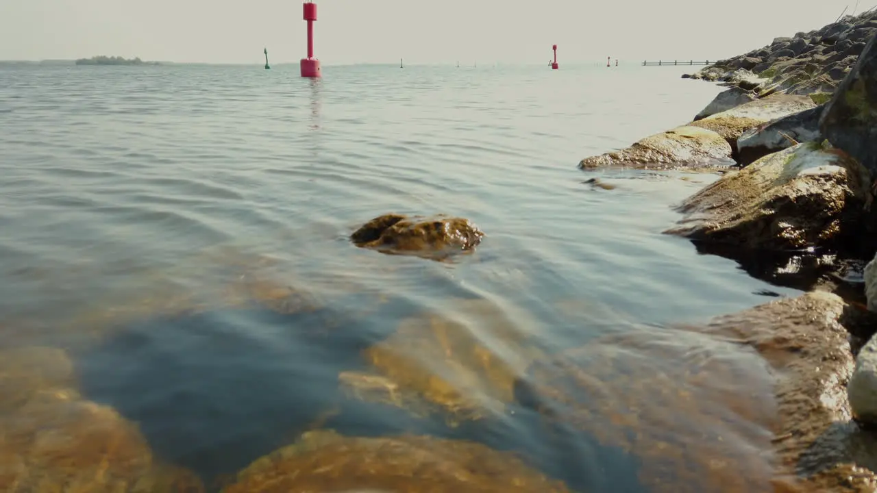 Video of calming waves of the ocean during a warm sunny morning