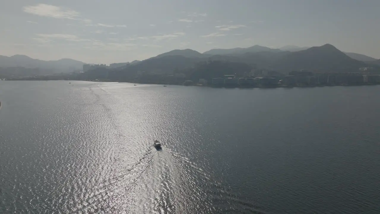 Aerial Drone shot of boats sailing in Hong Kong waters China