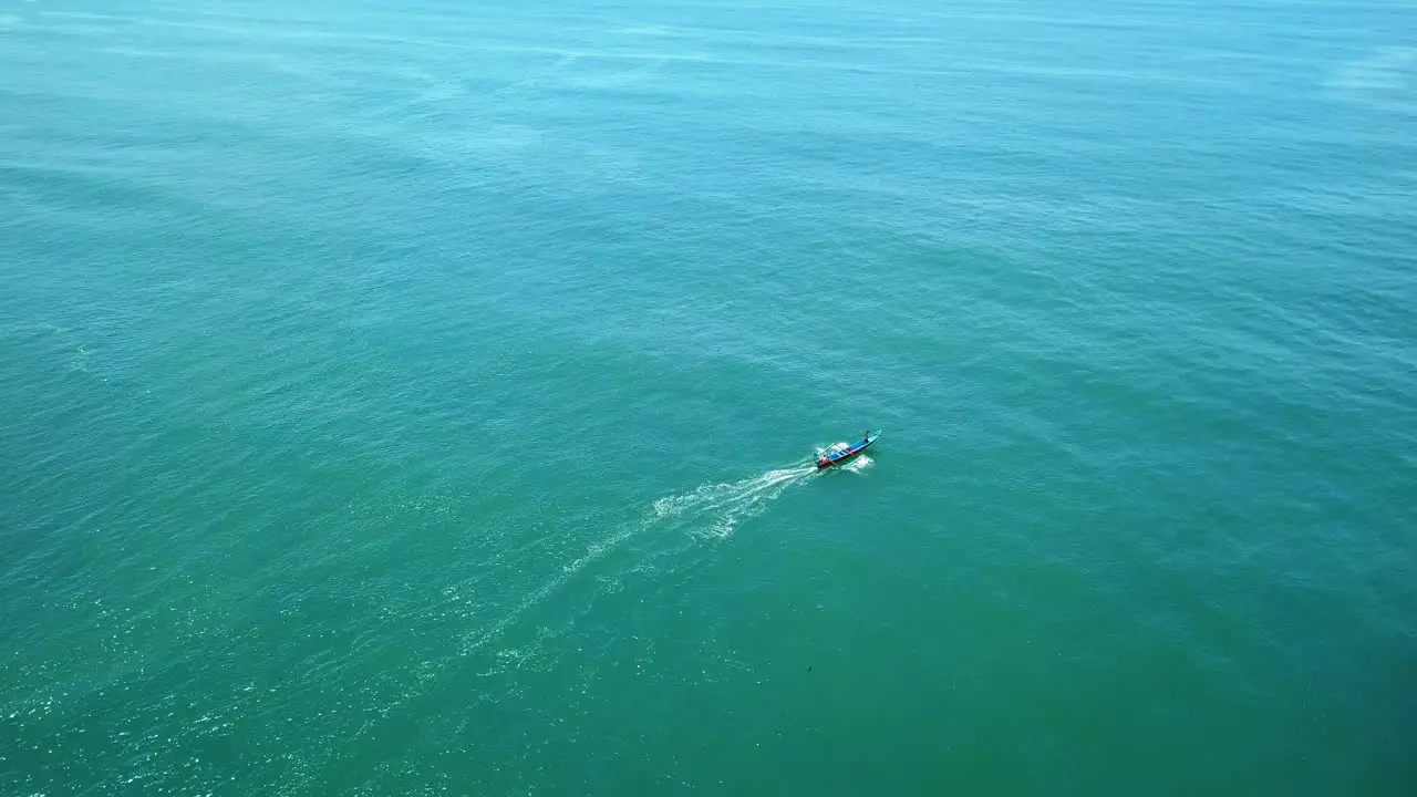 Aerial view of a traditional fisherman boat cruising on sea Indonesian traditional fishermen