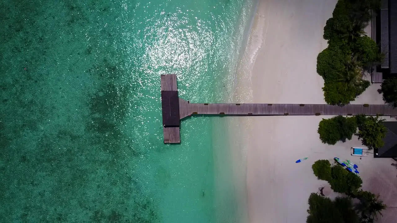 Birds eye view over resort gangway and shimmering turquoise waters in Seychelles