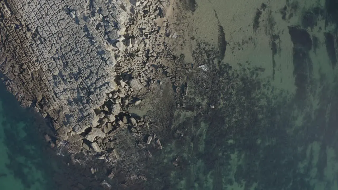 top aerial view of beach in cascais seen from above