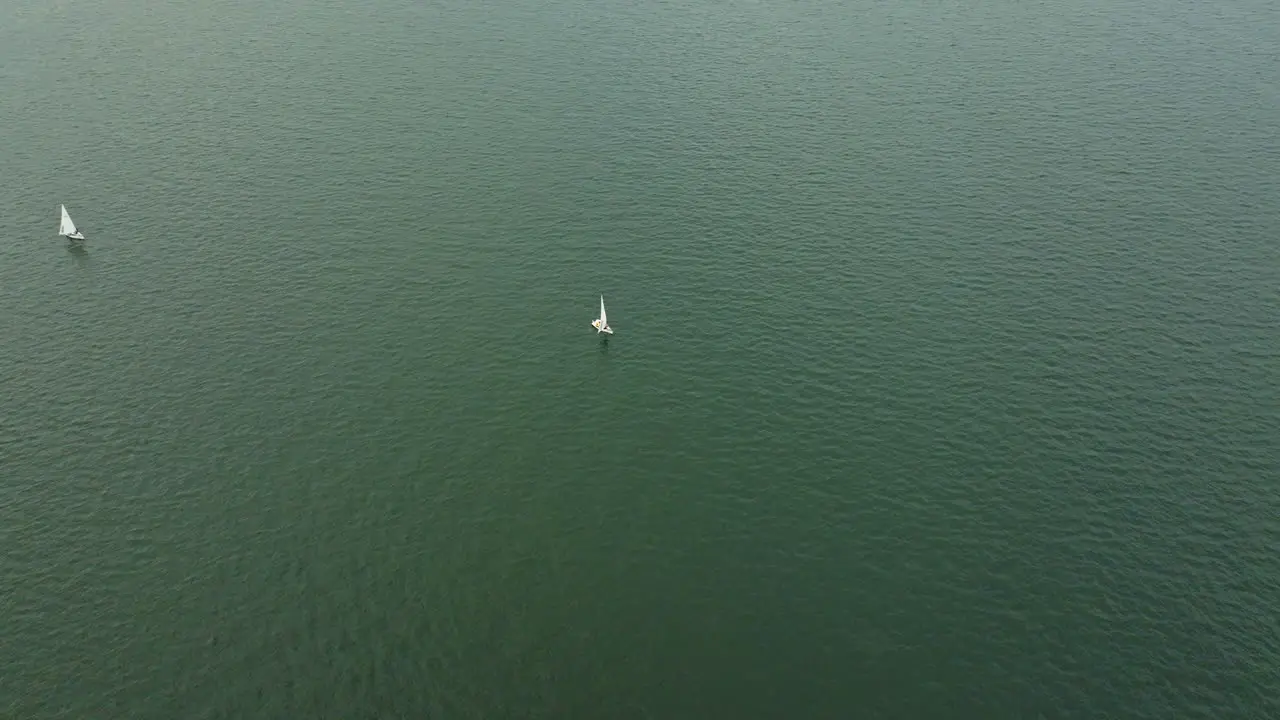 Aerial Drone shot of sailing tourism Boat on the water in Hong Kong China