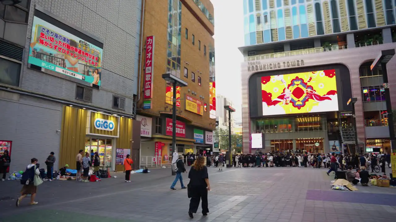 Slow motion pan of cine city square in Kabukicho Towers