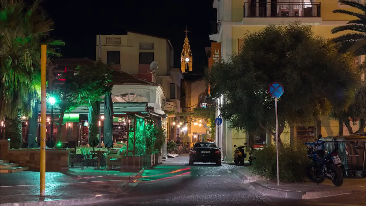 Busy bustling street in Summer at night tourism travel long exposure time lapse