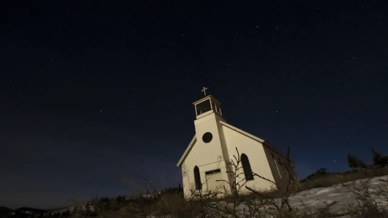 Church with Stars Moving Around it Timelapse Starlapse