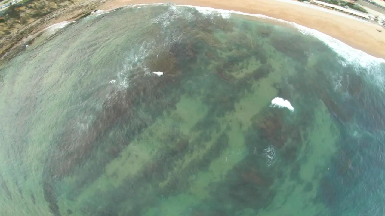 crossing a green and amazing ocean from sky