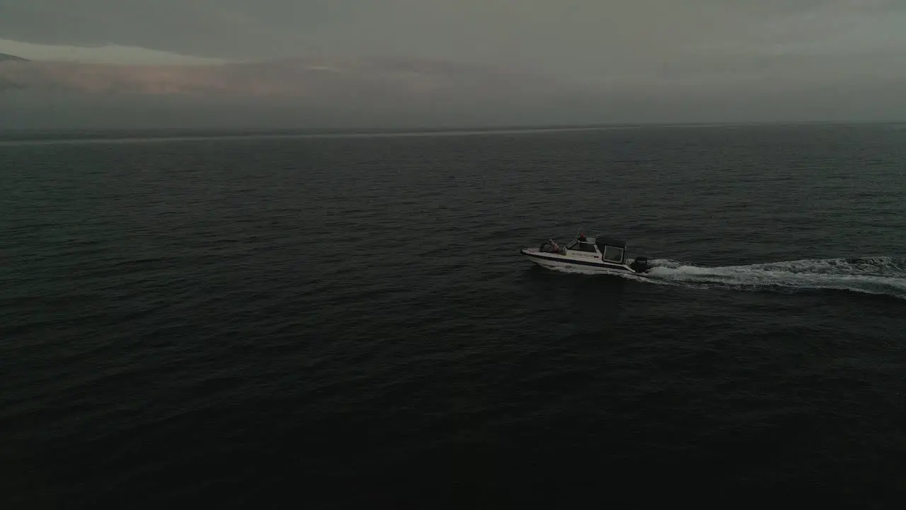 lonely boat in the pacific ocean view from a drone