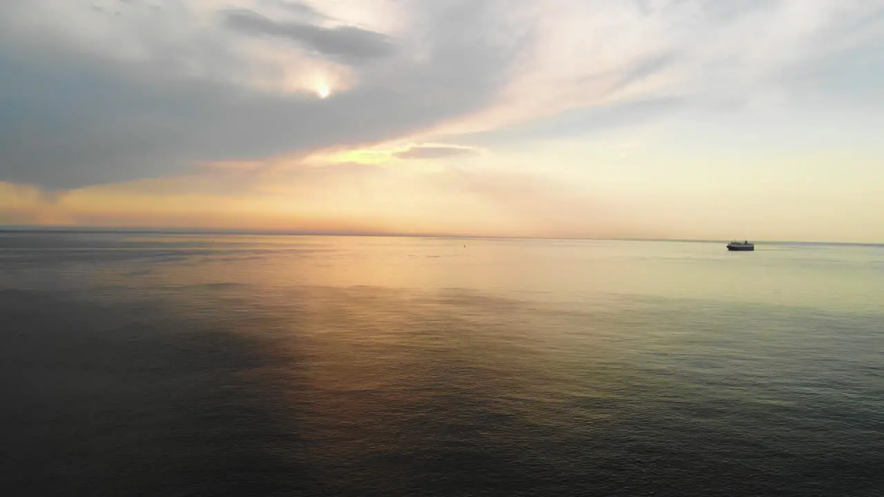 Big cruise ship sails on the open waters of the North Sea during a beautiful sunset