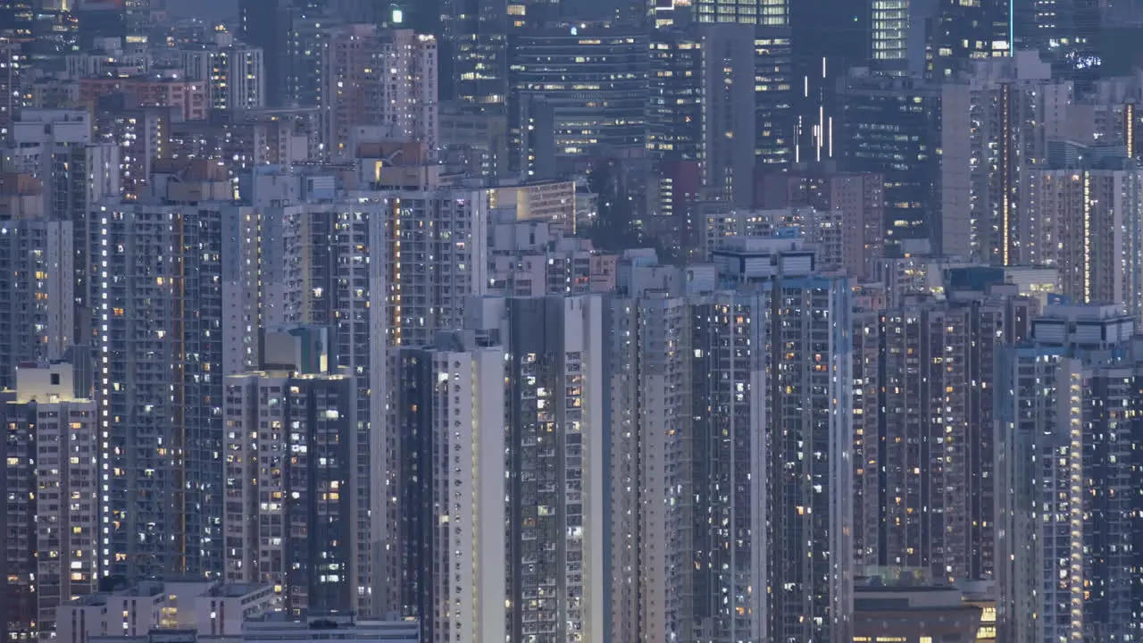 Time Lapse of blinking building windows from day to night